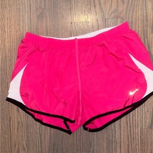 Pink Nike running shorts